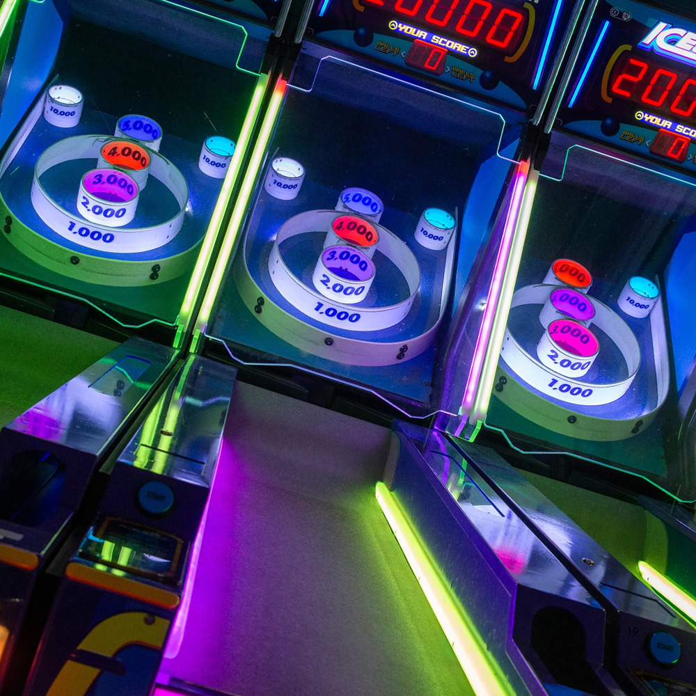 Neon Arcade skee-ball lanes
