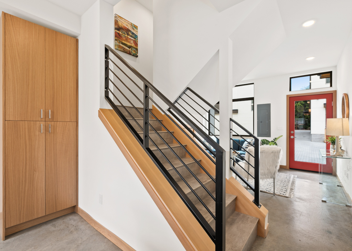 Haberzetle Homes Playful All-Electric 4-Star Townhomes stairway and storage