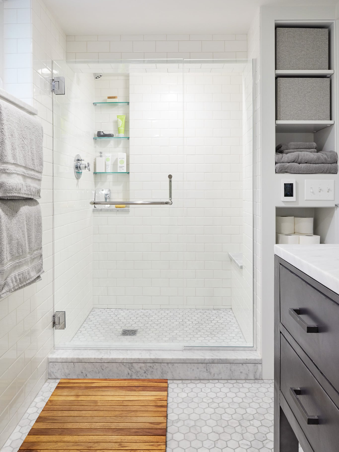 Wall-mounted programmable thermostat for heated floors in a Mt. Baker bathroom remodel (Photo: Cindy Apple Photography for Model Remodel)