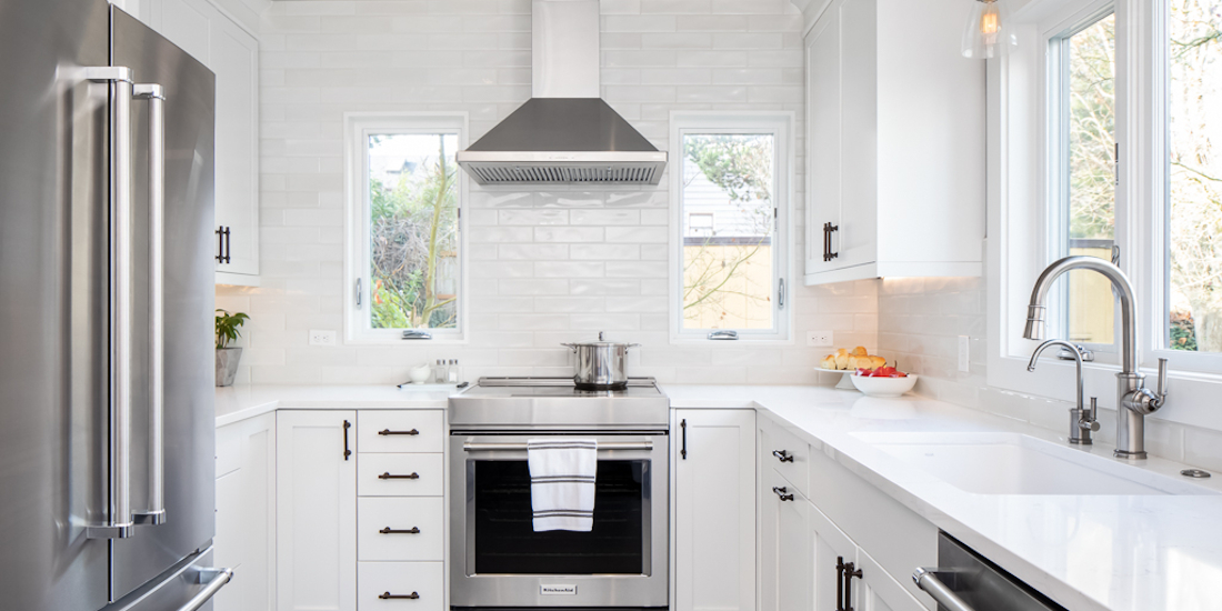 A U-shaped kitchen remodel illustrates the kitchen work triangle which is formed by three points: the stove, sink, and refrigerator. (Photo: Cindy Apple Photography for Model Remodel)