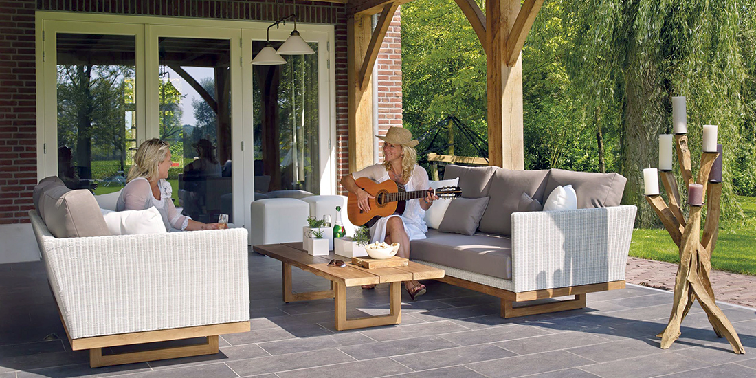 Two women relaxing on a patio